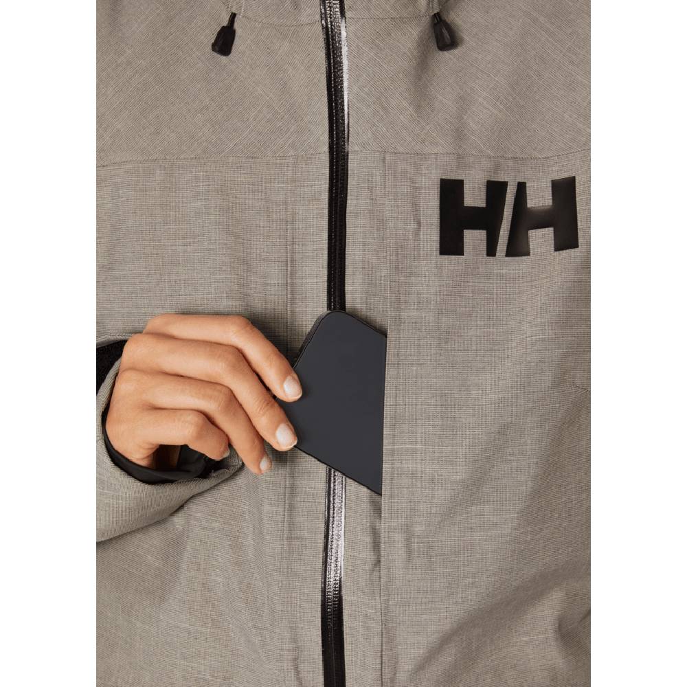 Helly Hansen Powderqueen 3.0 Womens Jacket 2024 Terrazzo On Model Phone Pocket Front Detail
